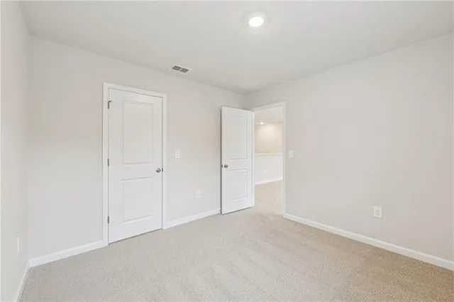 an empty room with a natural light