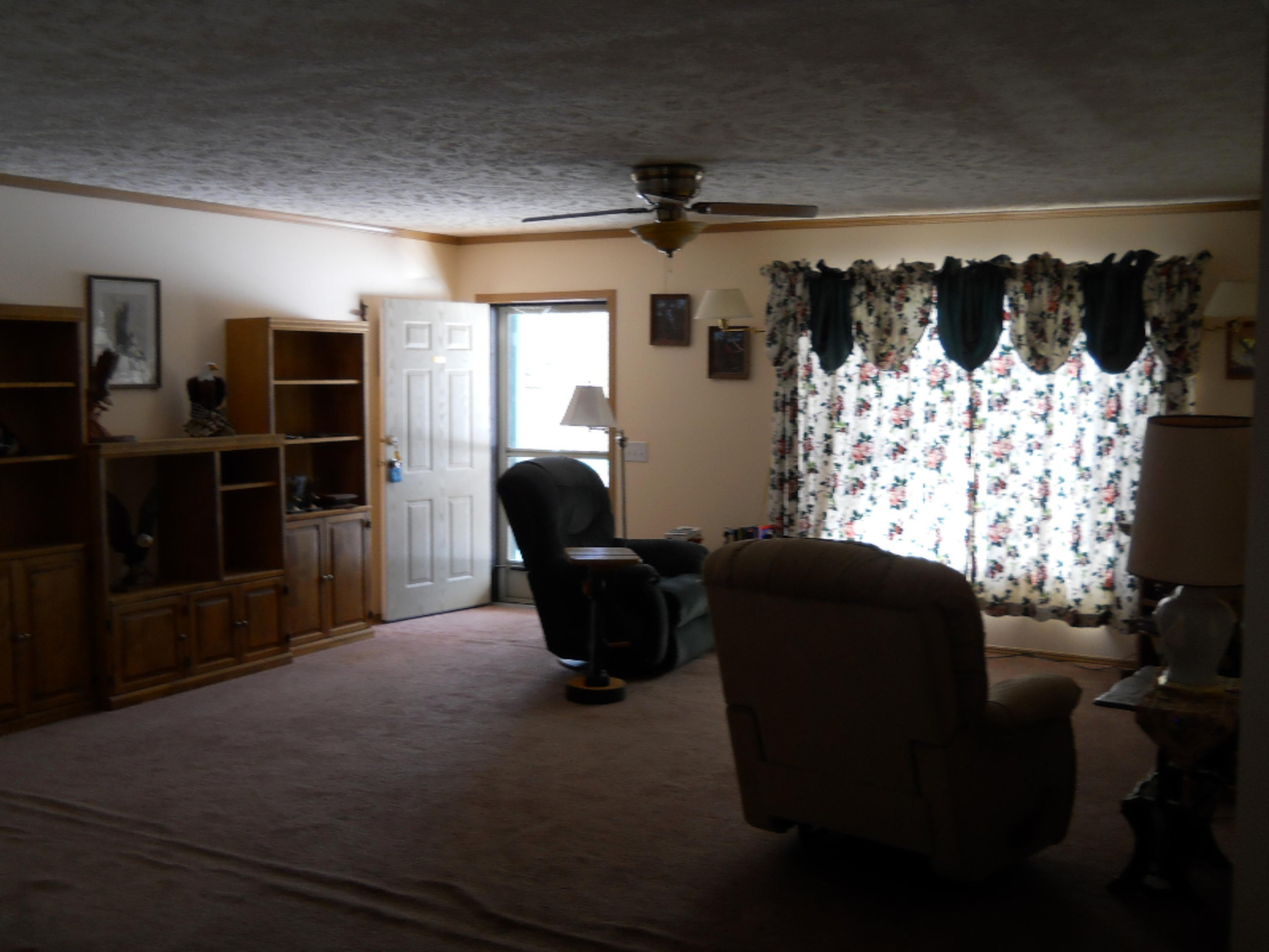 8232 13 Mile Road Mecosta, MI 49332 - Photo 2 of 20 Living room.