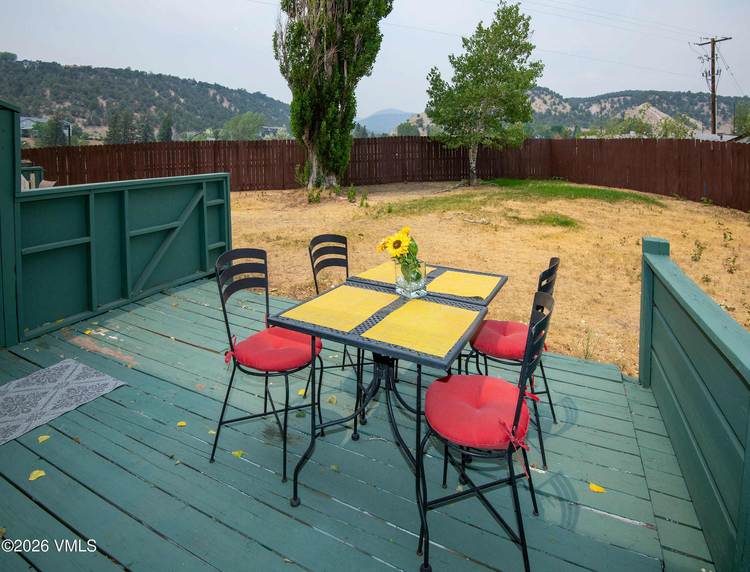 85 Chambers Avenue, Unit 10 Eagle, CO 81631 - Photo 28 of 41 a view of a chairs and table in the terrace