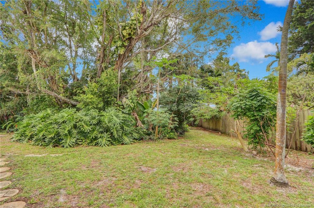 1230 Northwest Fork Road Stuart, FL 34994 - Photo 45 of 50 a view of an outdoor space and a yard