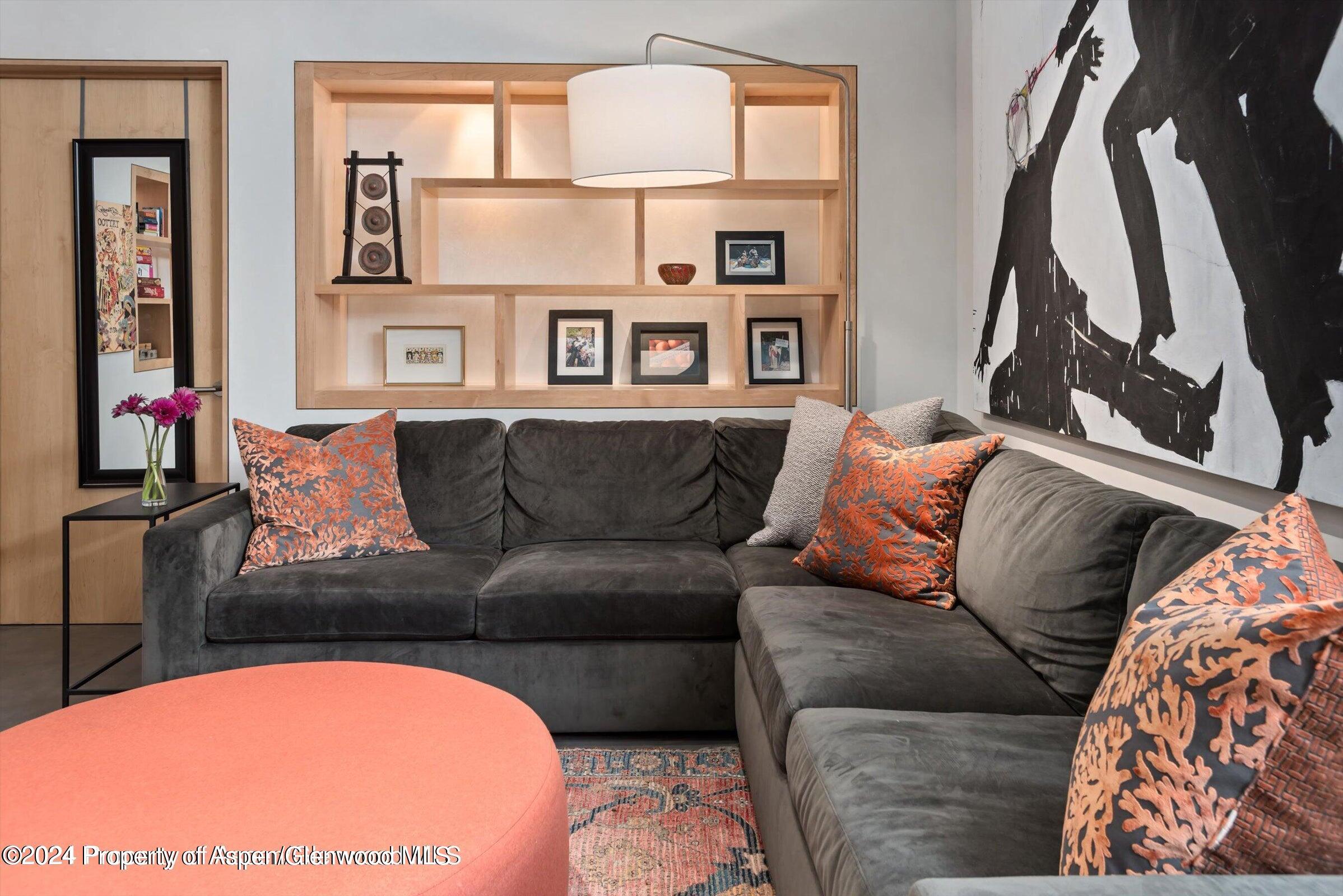 1015 Cemetery Lane Aspen, CO 81611 - Photo 30 of 46 a living room with furniture and a floor to ceiling window