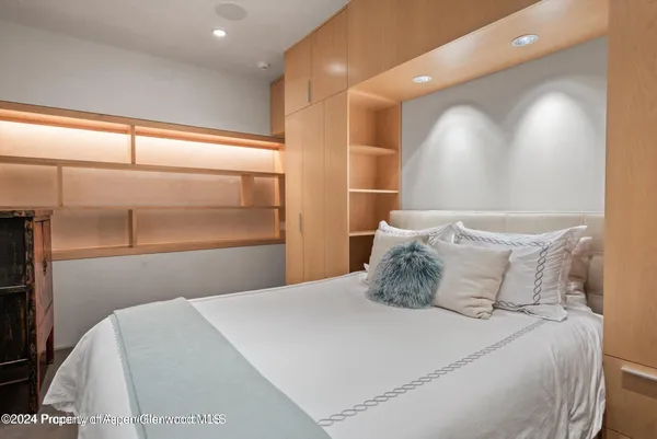 a bathroom with a sink toilet vanity and tub