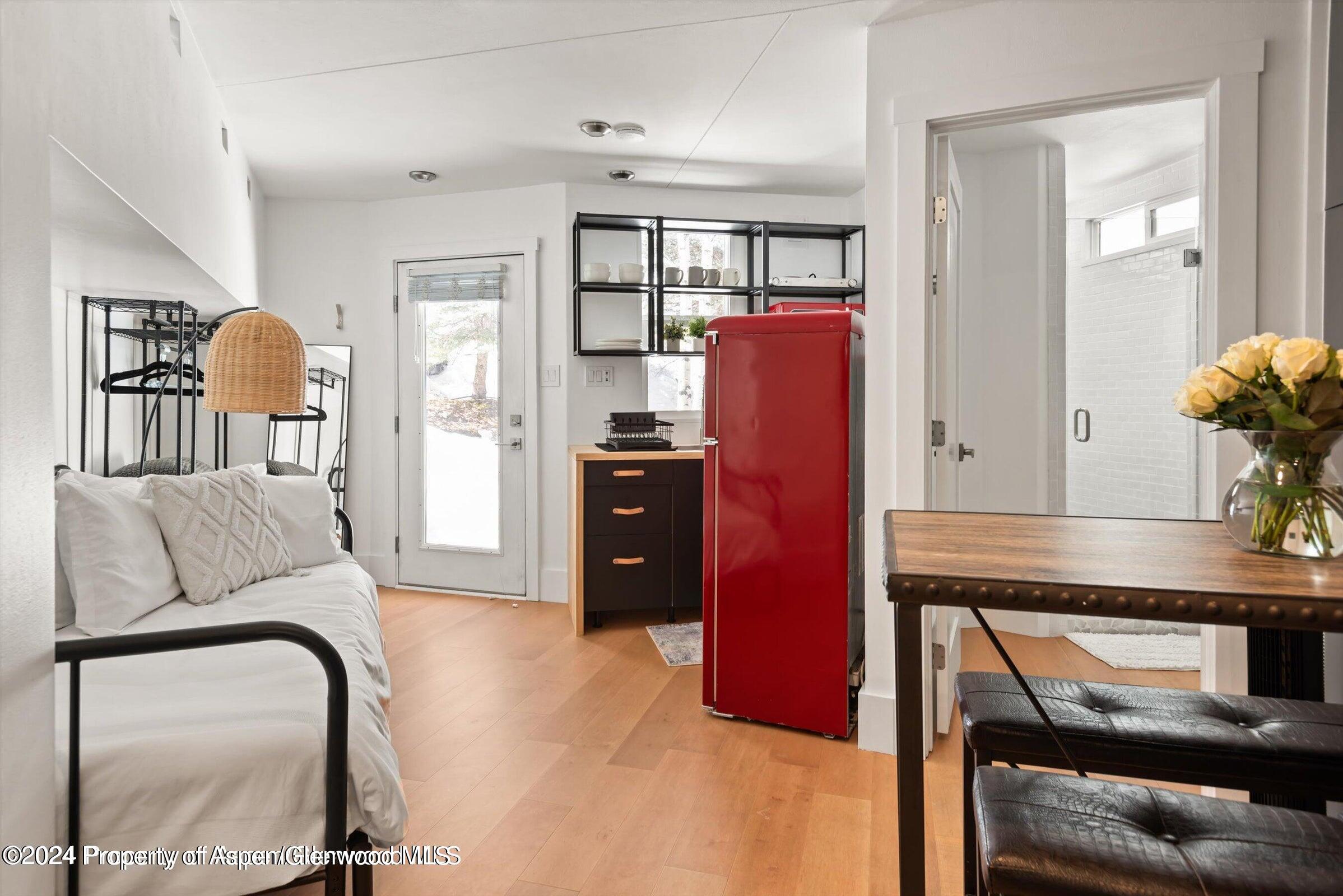 1015 Cemetery Lane Aspen, CO 81611 - Photo 37 of 46 a living room with furniture and wooden floor