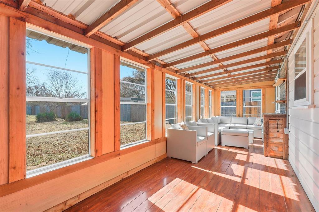 216 4th Street Joshua, TX 76058 - Photo 22 of 40 a living room with furniture and large windows