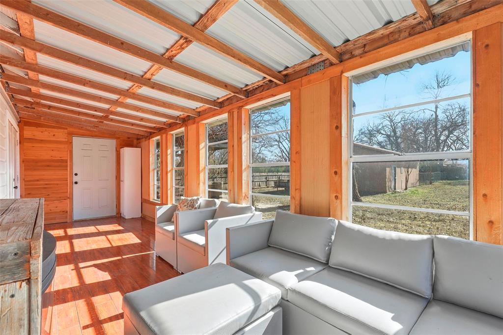 216 4th Street Joshua, TX 76058 - Photo 23 of 40 a living room with furniture and a large window