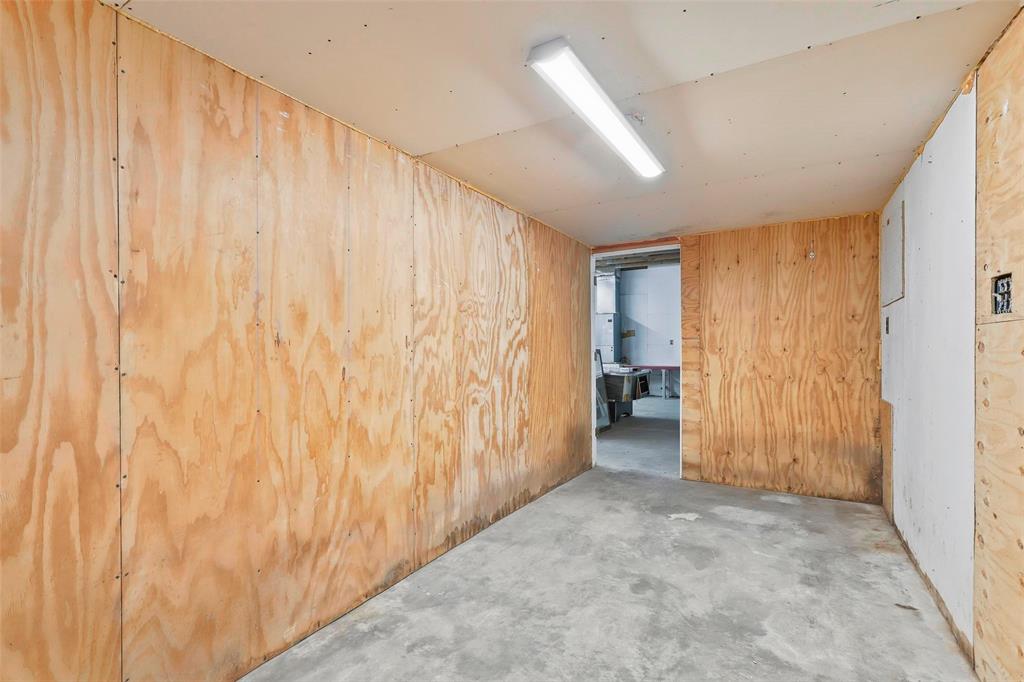 216 4th Street Joshua, TX 76058 - Photo 33 of 40 a view of a livingroom with wooden floor and a bathroom
