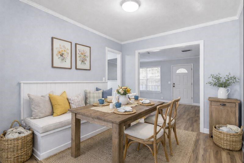 216 4th Street Joshua, TX 76058 - Photo 5 of 40 a view of a dining room with furniture and wooden floor