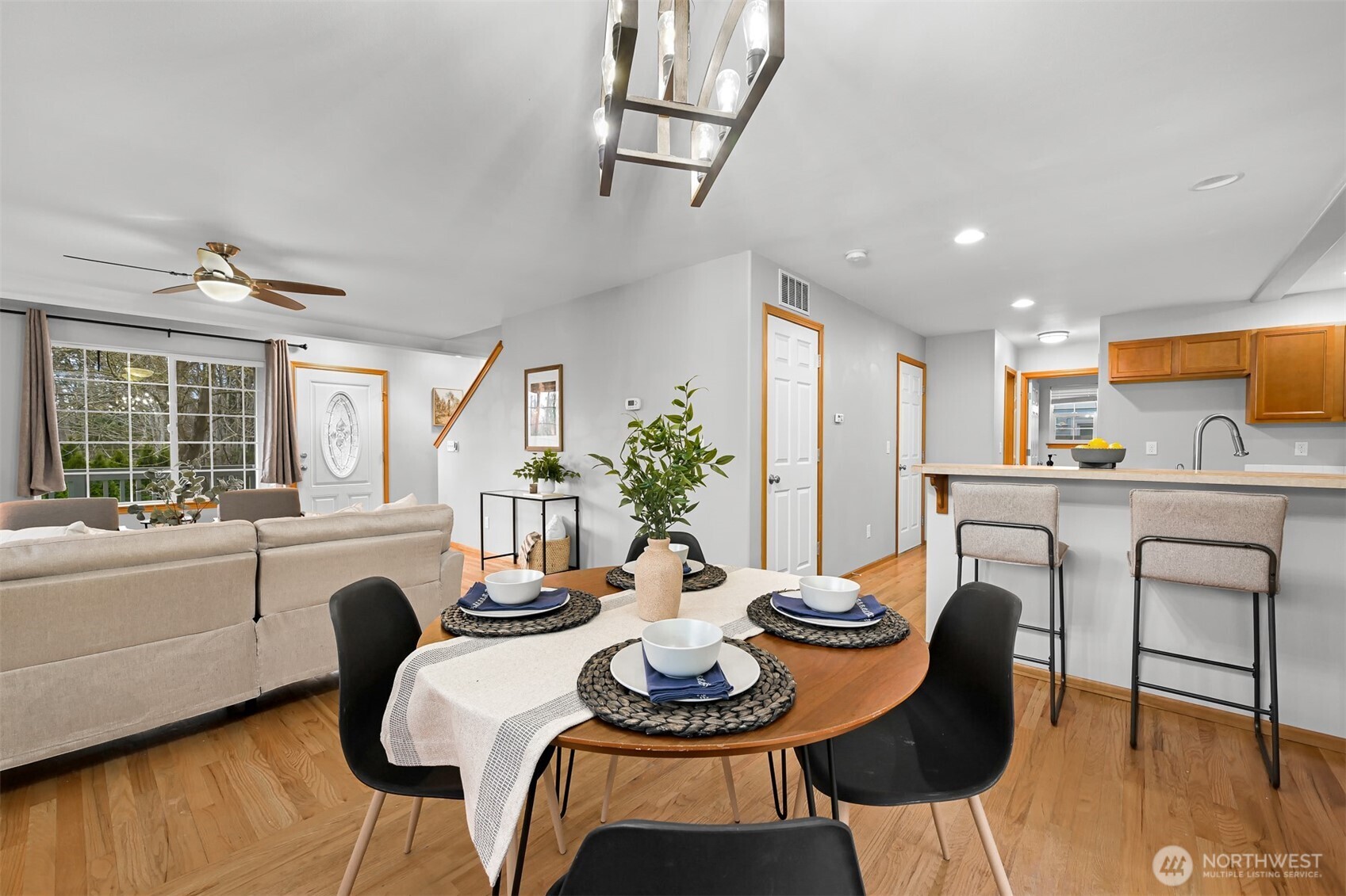 3500 South Avenue Bellingham, WA 98229 - Photo 11 of 38 a dining room with furniture a window and wooden floor