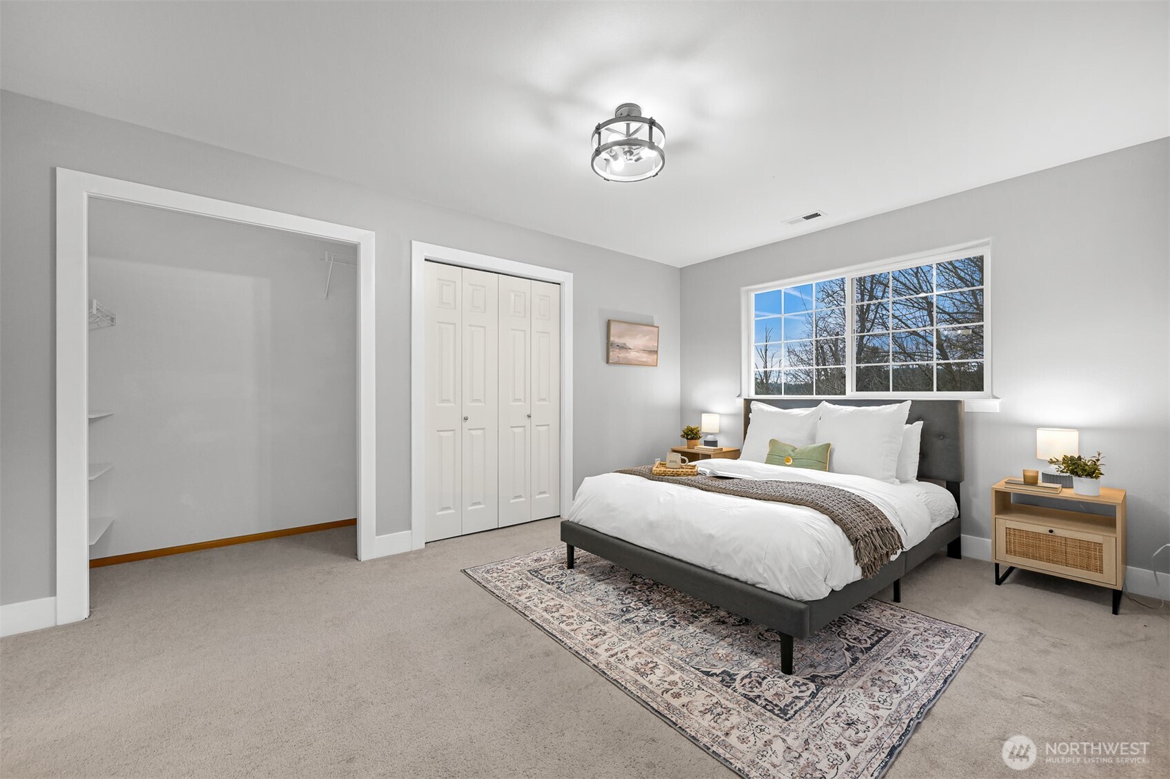 3500 South Avenue Bellingham, WA 98229 - Photo 15 of 38 a spacious bedroom with a bed and a window
