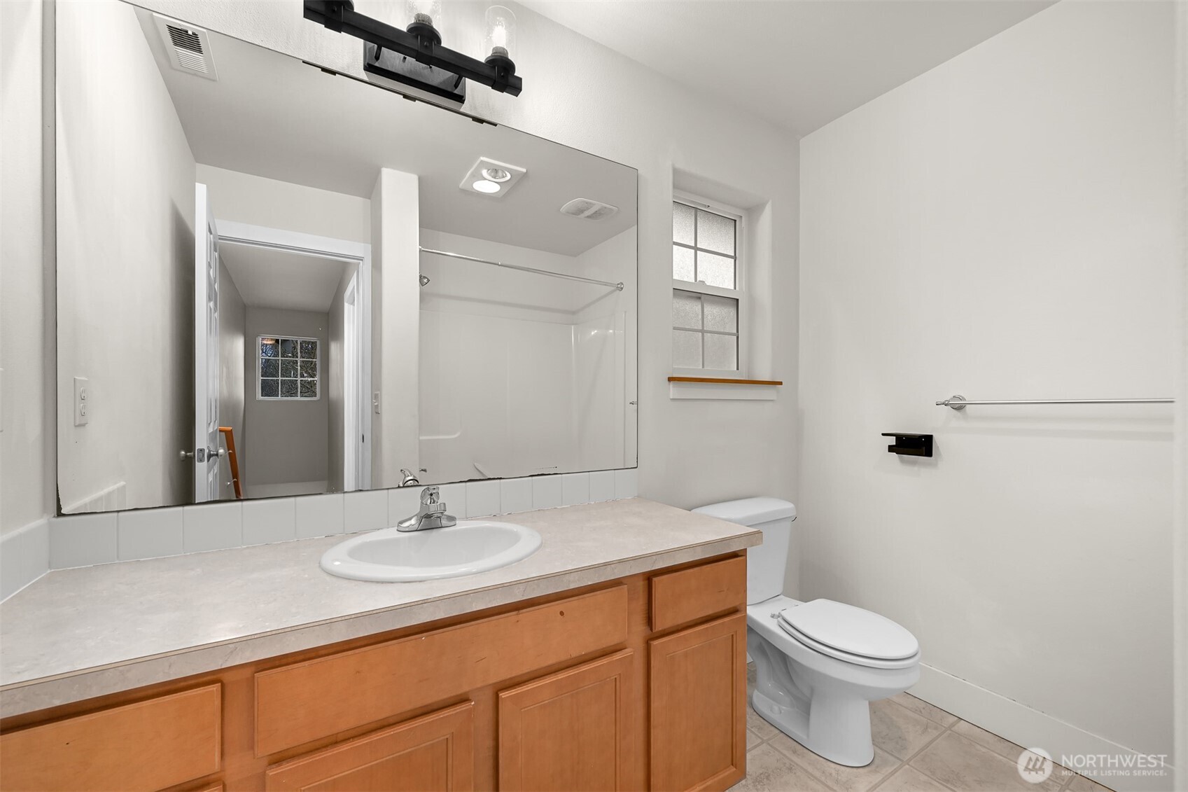 3500 South Avenue Bellingham, WA 98229 - Photo 20 of 38 a bathroom with a sink a toilet and shower