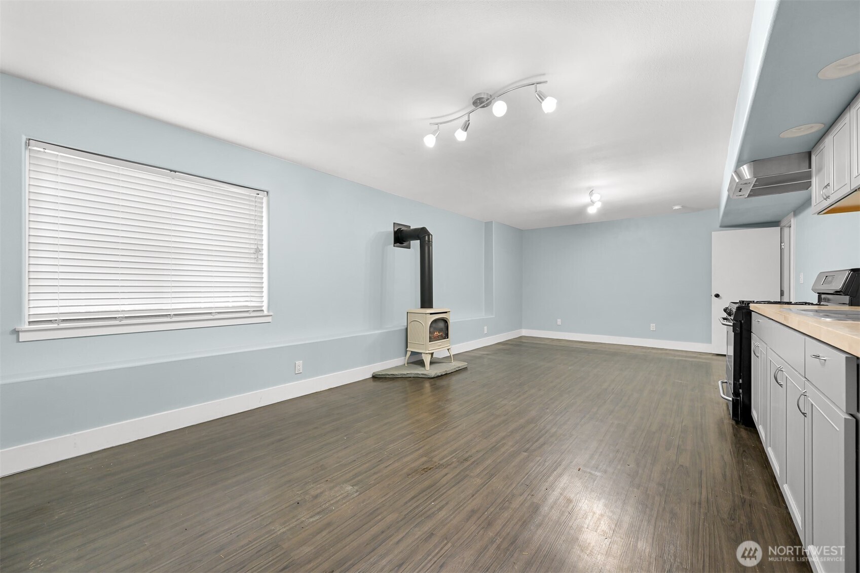 3500 South Avenue Bellingham, WA 98229 - Photo 26 of 38 a view of a room with gym equipment and wooden floor