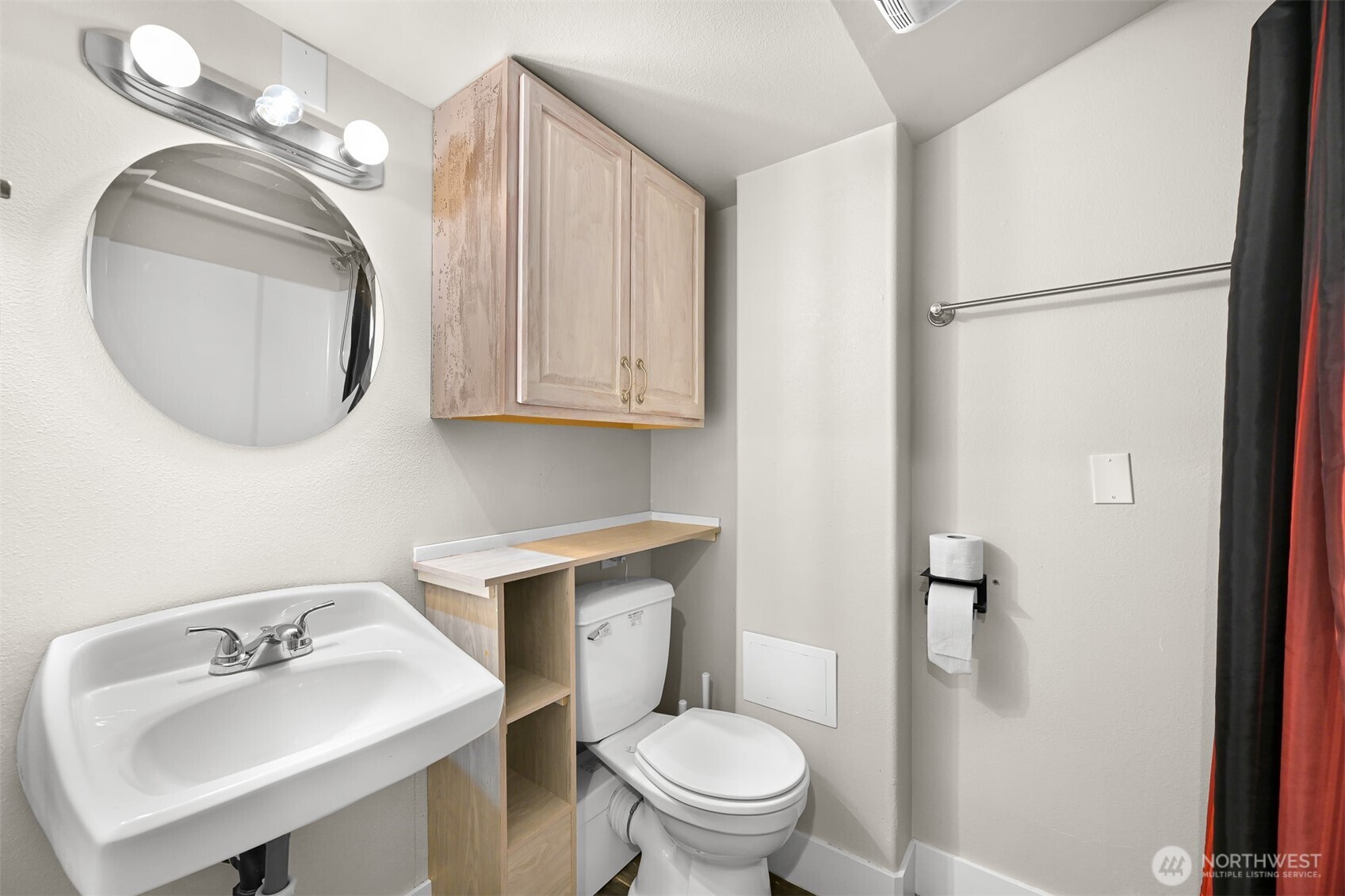 3500 South Avenue Bellingham, WA 98229 - Photo 29 of 38 a bathroom with a toilet sink and mirror