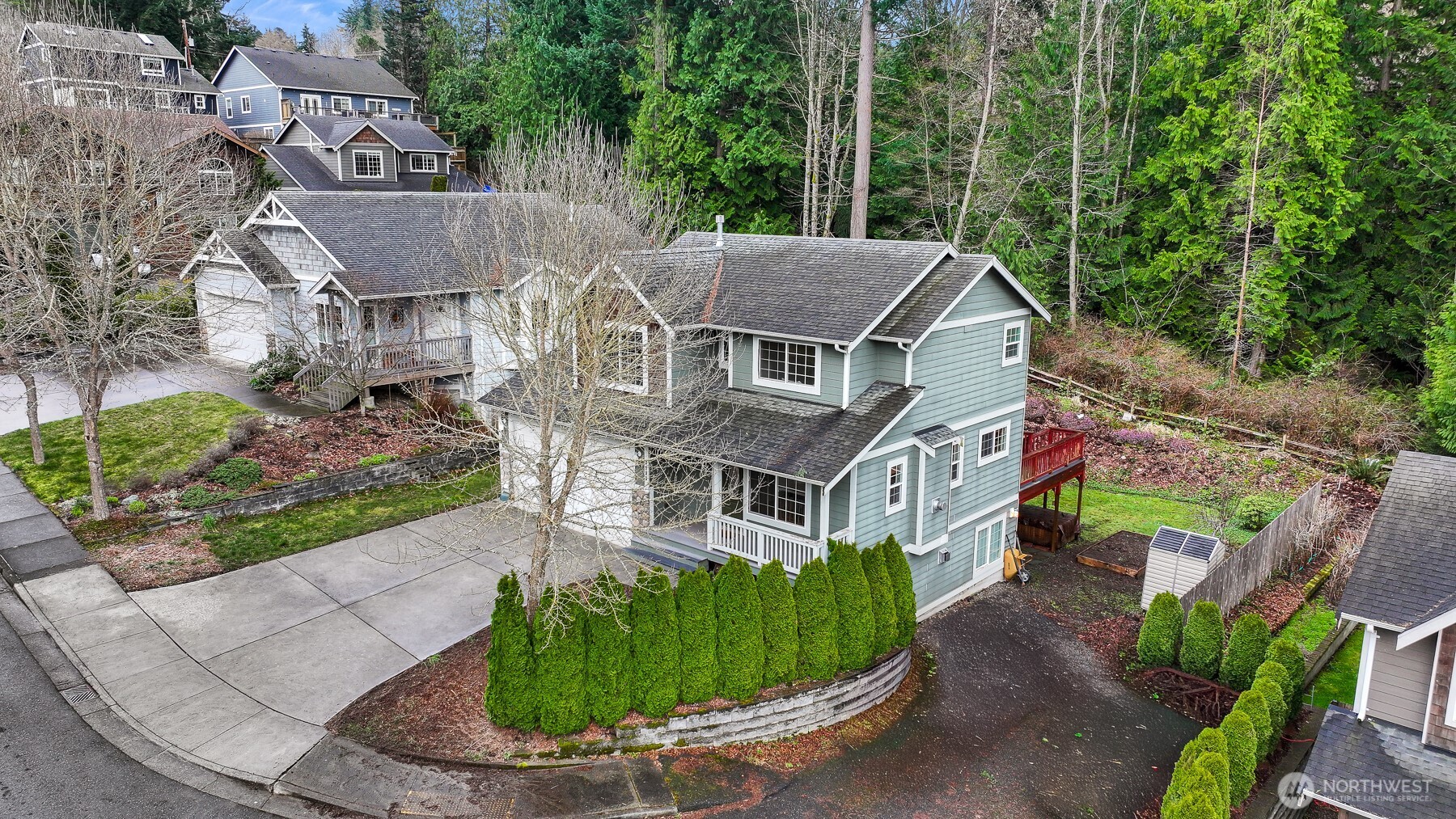 3500 South Avenue Bellingham, WA 98229 - Photo 3 of 38 an aerial view of a house with a yard and large trees