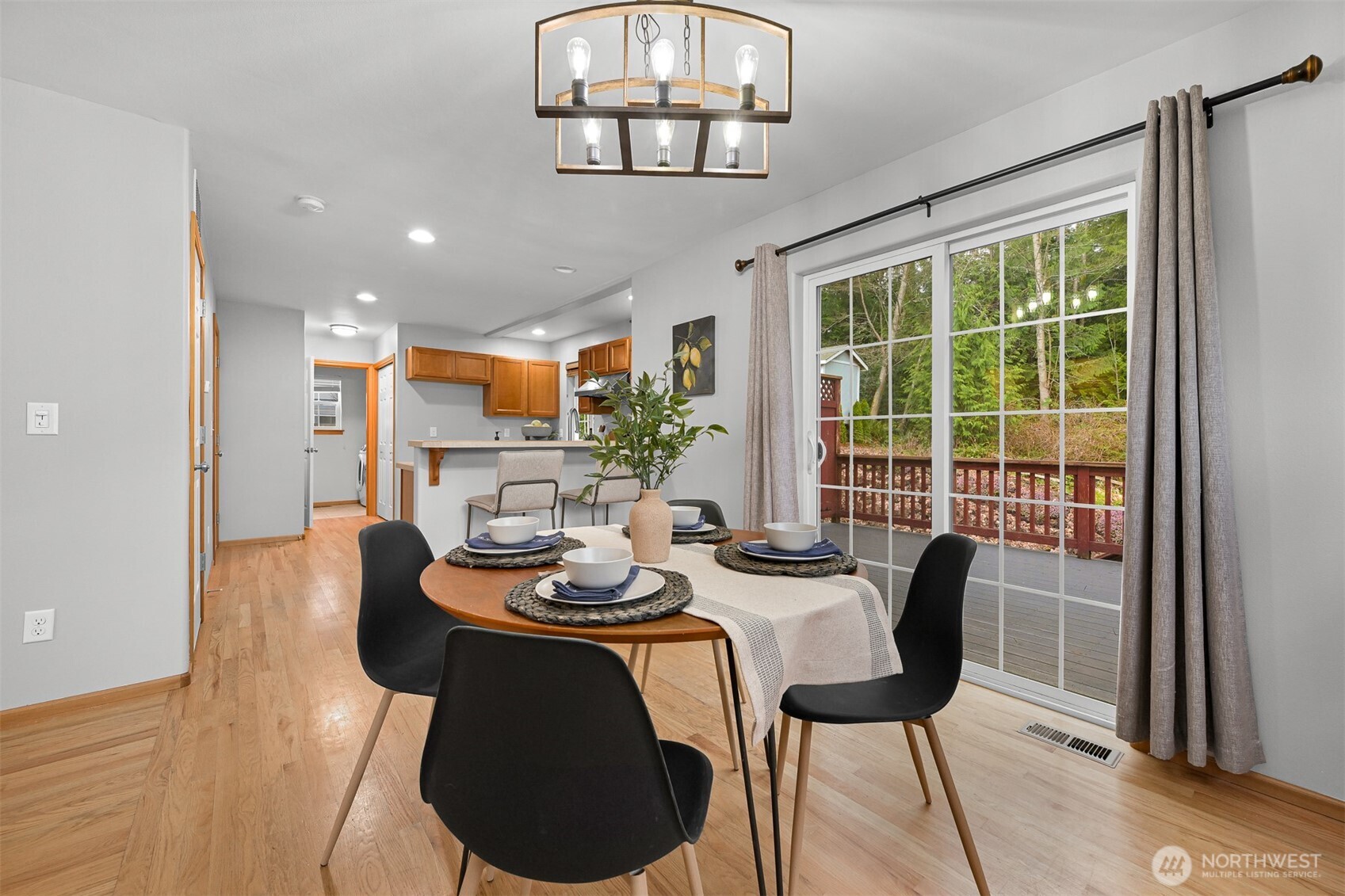 3500 South Avenue Bellingham, WA 98229 - Photo 9 of 38 a view of a dining room with furniture window and wooden floor