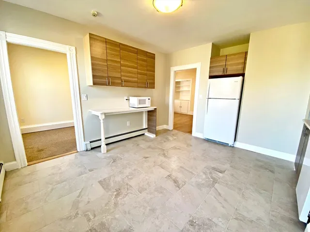 a view of room with an empty room and window