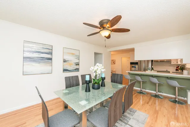 a workspace with furniture and wooden floor