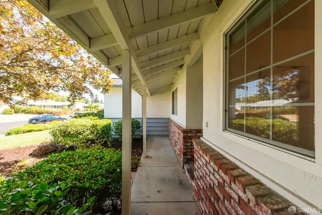 a view of a house with a garden