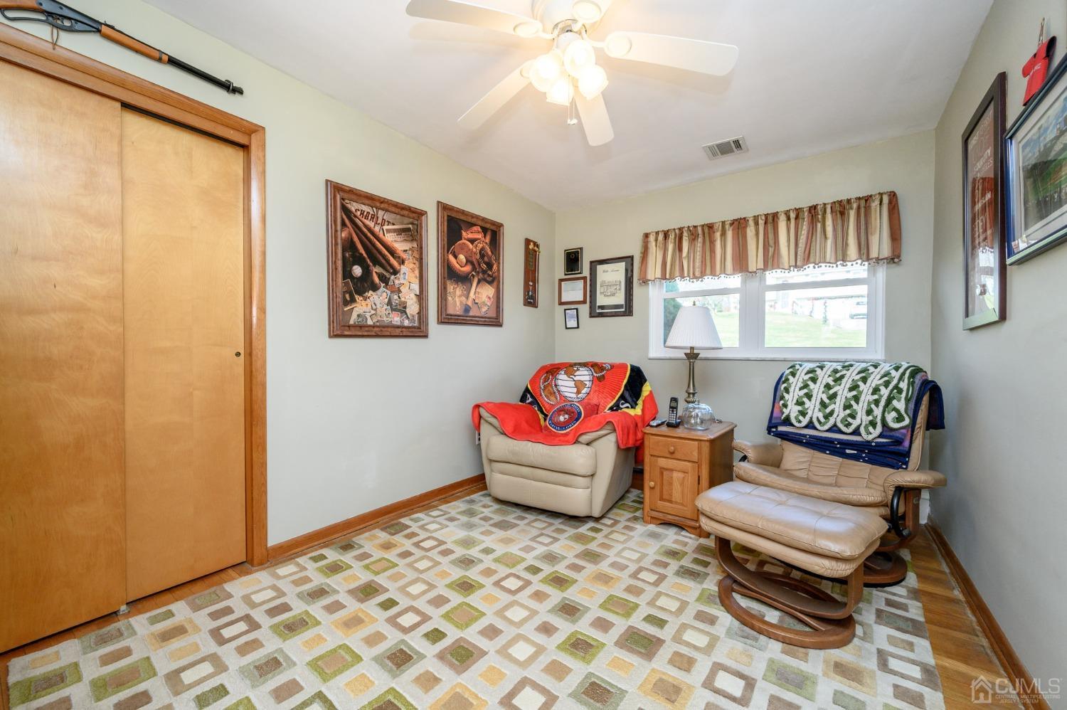 7 Putters Road Succasunna, NJ 07876 - Photo 17 of 40 a living room with furniture and a window