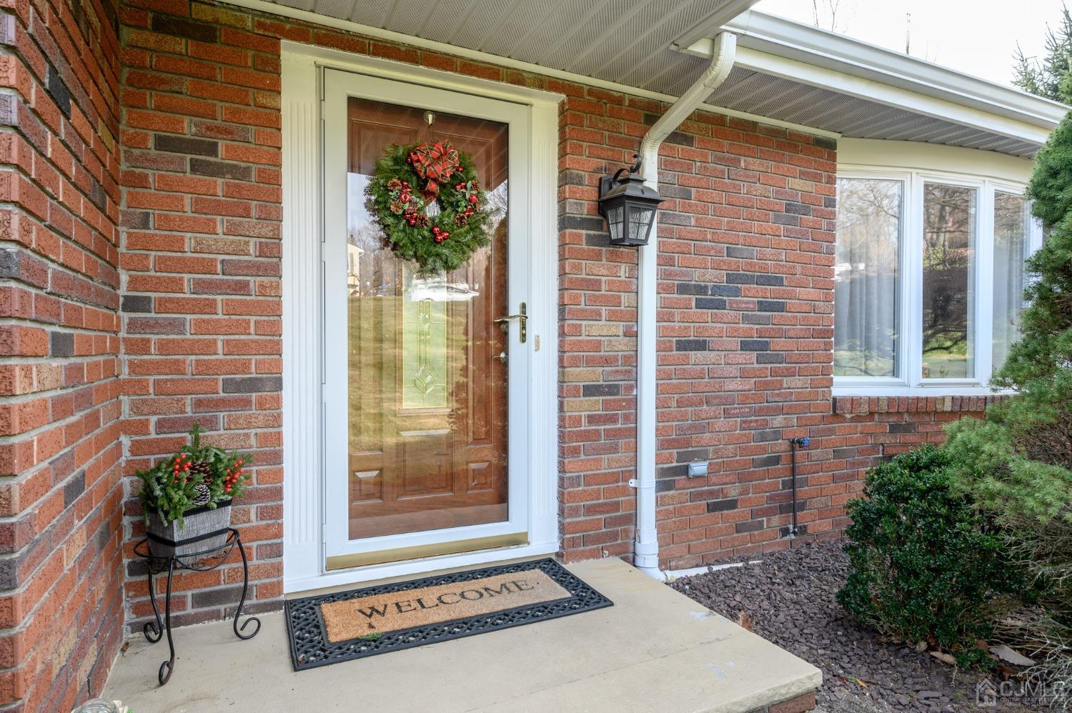 7 Putters Road Succasunna, NJ 07876 - Photo 2 of 40 a front view of a house with a garden