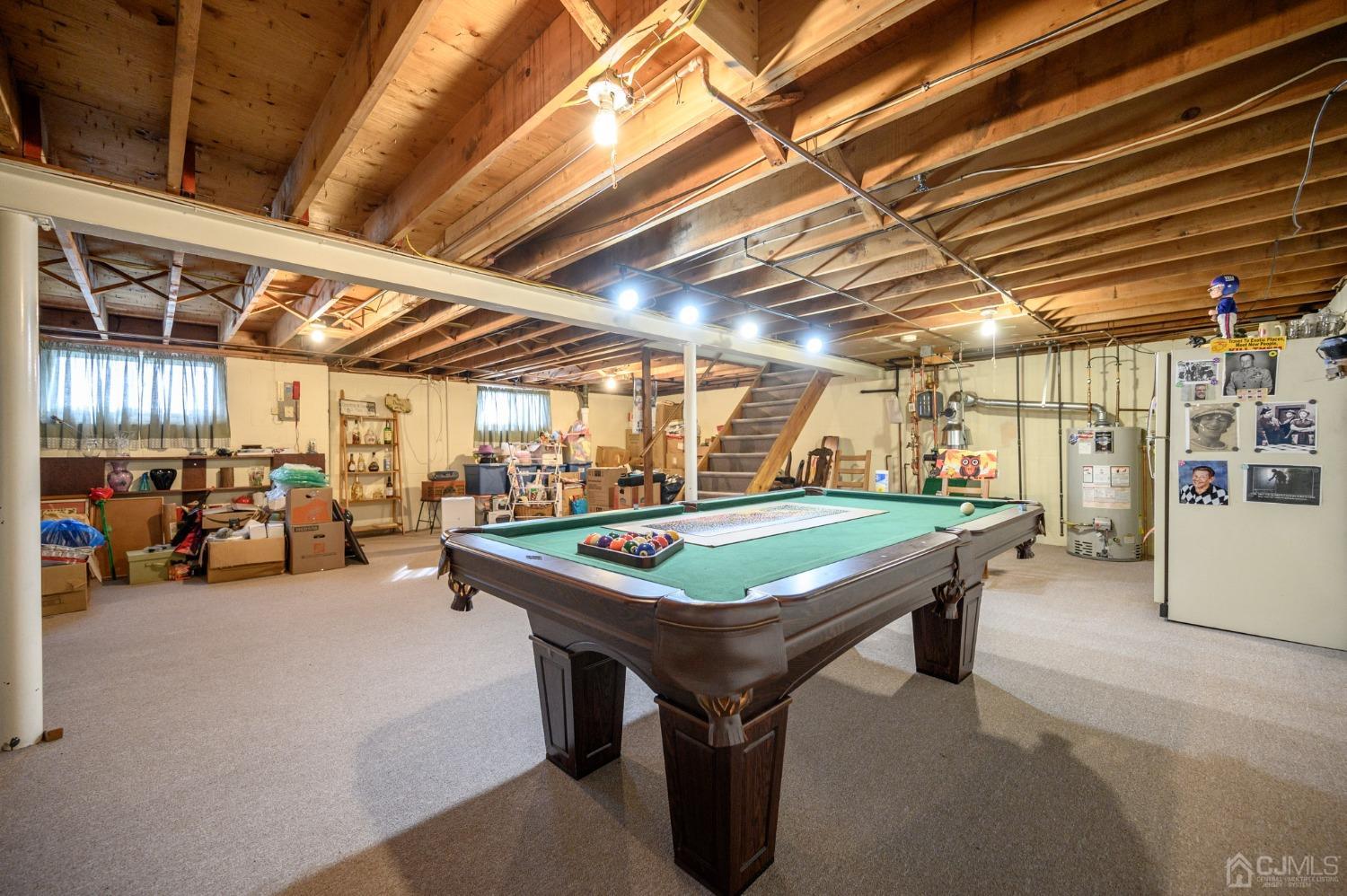 7 Putters Road Succasunna, NJ 07876 - Photo 27 of 40 a room with lots of furniture and car