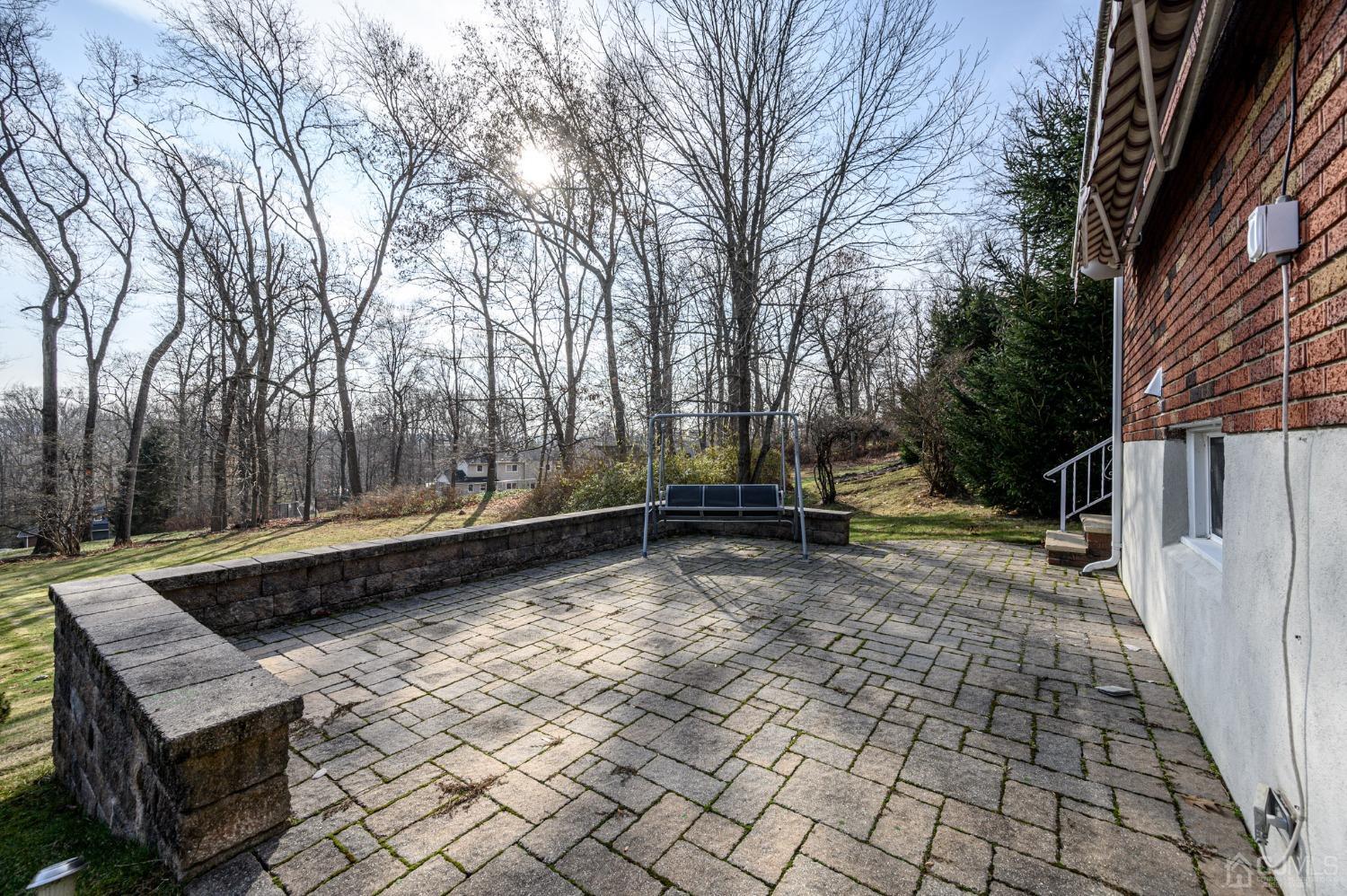7 Putters Road Succasunna, NJ 07876 - Photo 28 of 40 a view of a backyard with sitting area