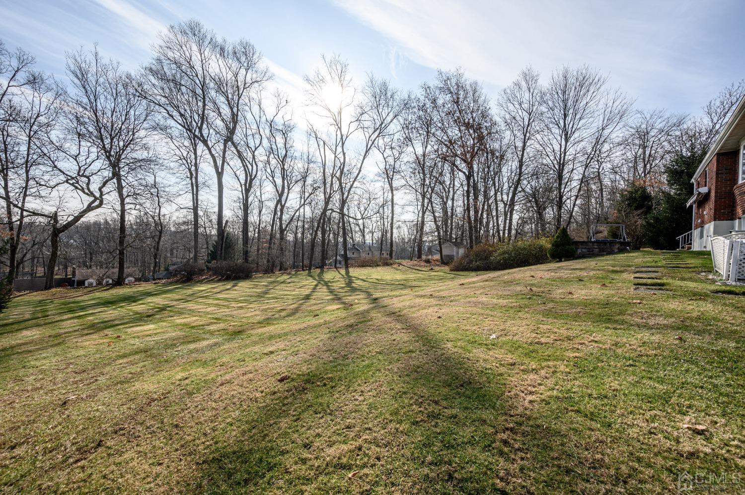 7 Putters Road Succasunna, NJ 07876 - Photo 33 of 40 a house view with swimming pool in front of house