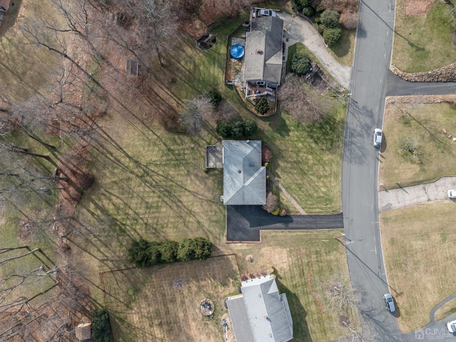 7 Putters Road Succasunna, NJ 07876 - Photo 38 of 40 an aerial view of residential houses with outdoor space
