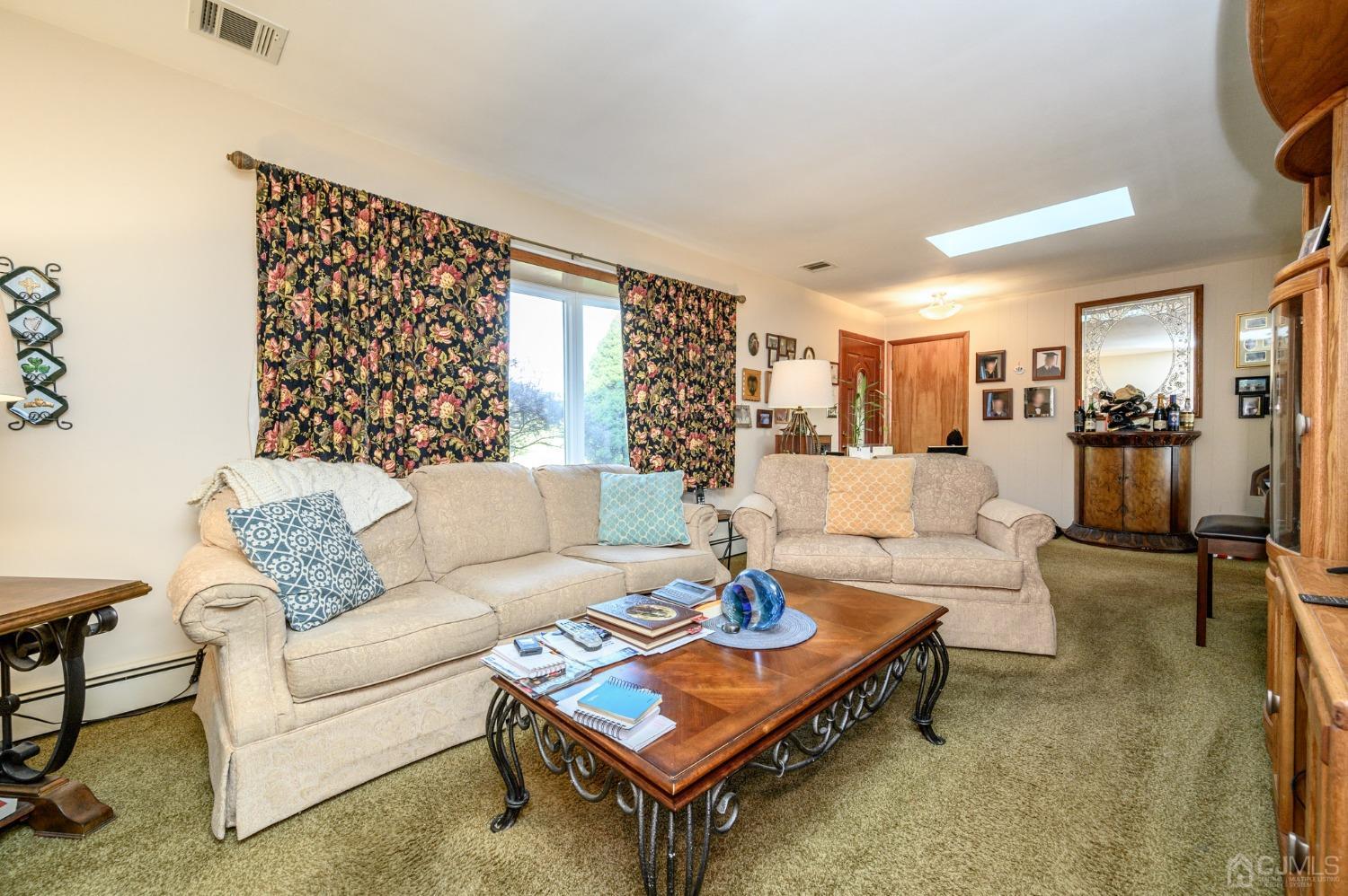 7 Putters Road Succasunna, NJ 07876 - Photo 5 of 40 a living room with furniture and a flat screen tv