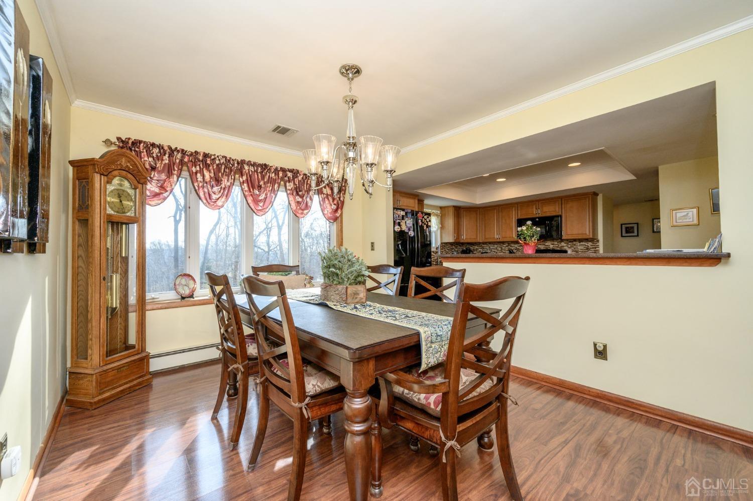7 Putters Road Succasunna, NJ 07876 - Photo 7 of 40 a view of a dining room with furniture and window