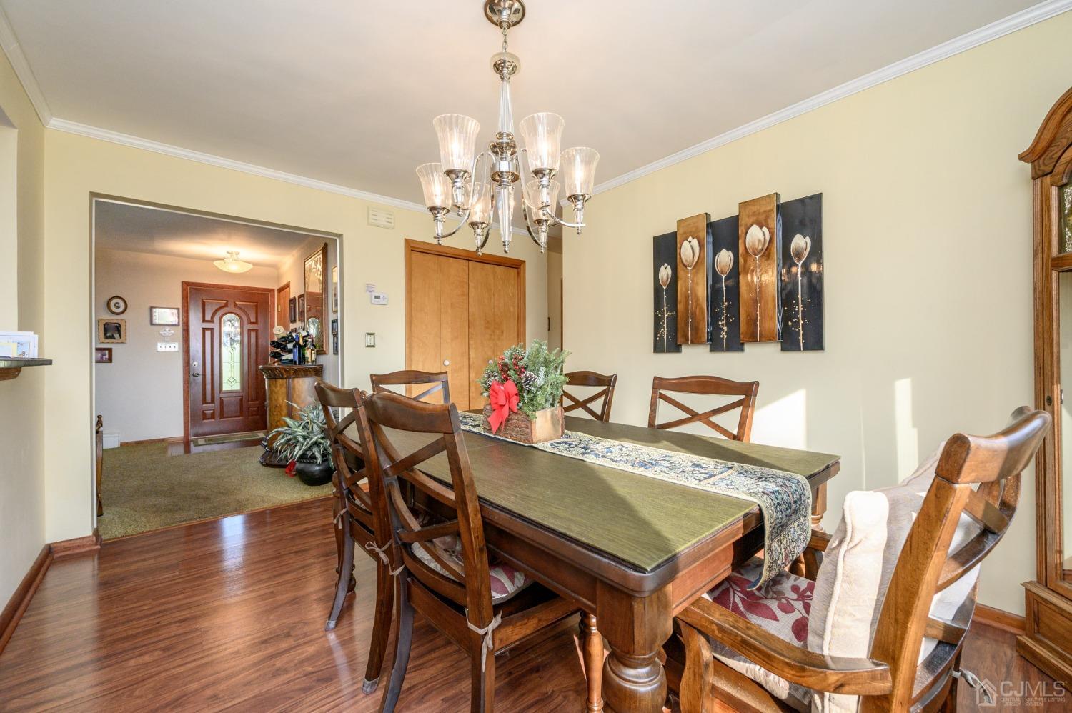 7 Putters Road Succasunna, NJ 07876 - Photo 8 of 40 a view of a dining room with furniture and wooden floor