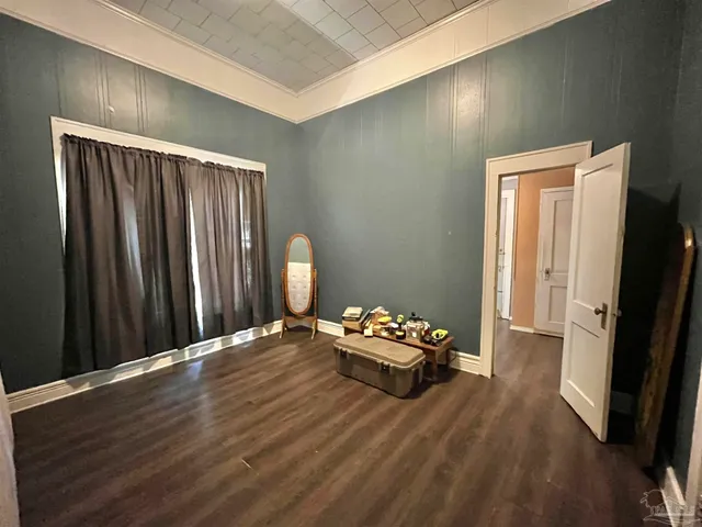 a hallway with wooden floor