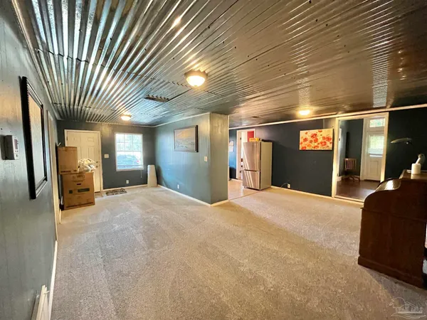 a view of large hall with wooden floor