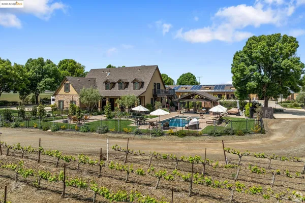 a view of multiple houses with a yard