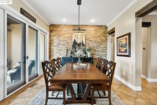 a bathroom with a sink a toilet a mirror and shower