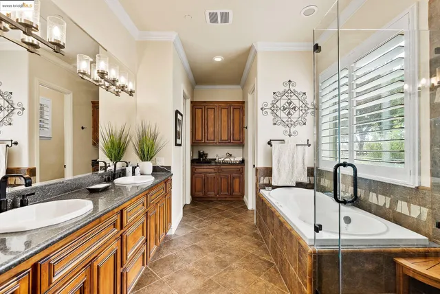 a bedroom with a bed and walk in closet