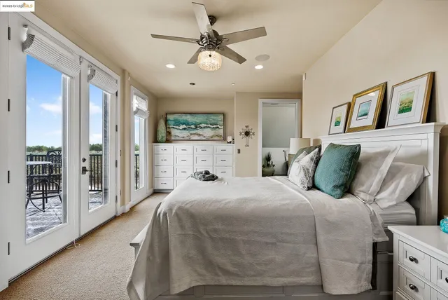 a view of swimming pool with lounge chairs