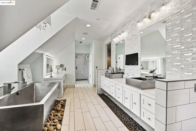 a view of a house with backyard porch and sitting area