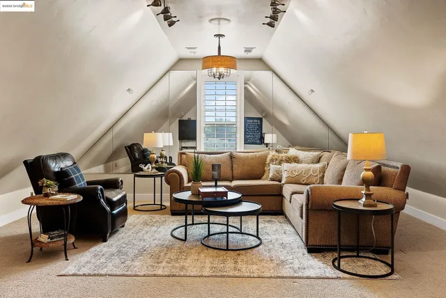 a bathroom with a sink a mirror and next to a window