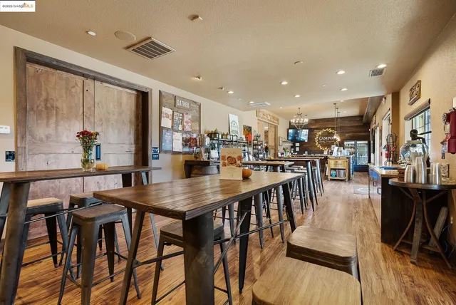 a view of swimming pool with seating area