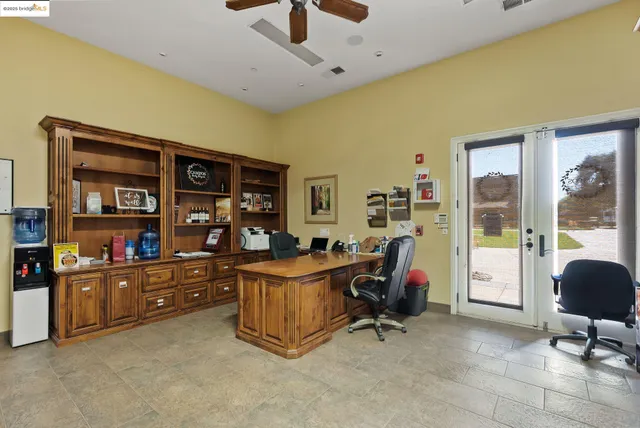a view of a patio in backyard