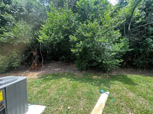 a view of backyard with green space