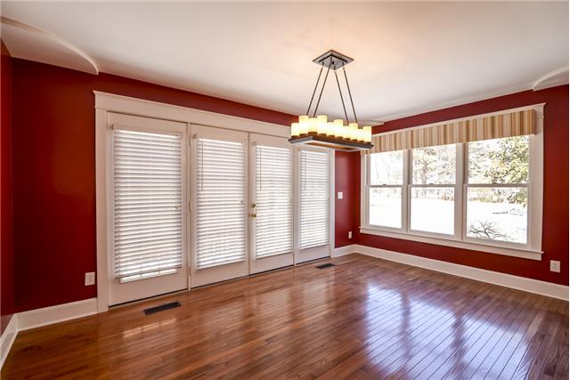 1221 Cooks Road Mount Juliet, TN 37122 - Photo 6 of 13 an empty room with wooden floor and windows