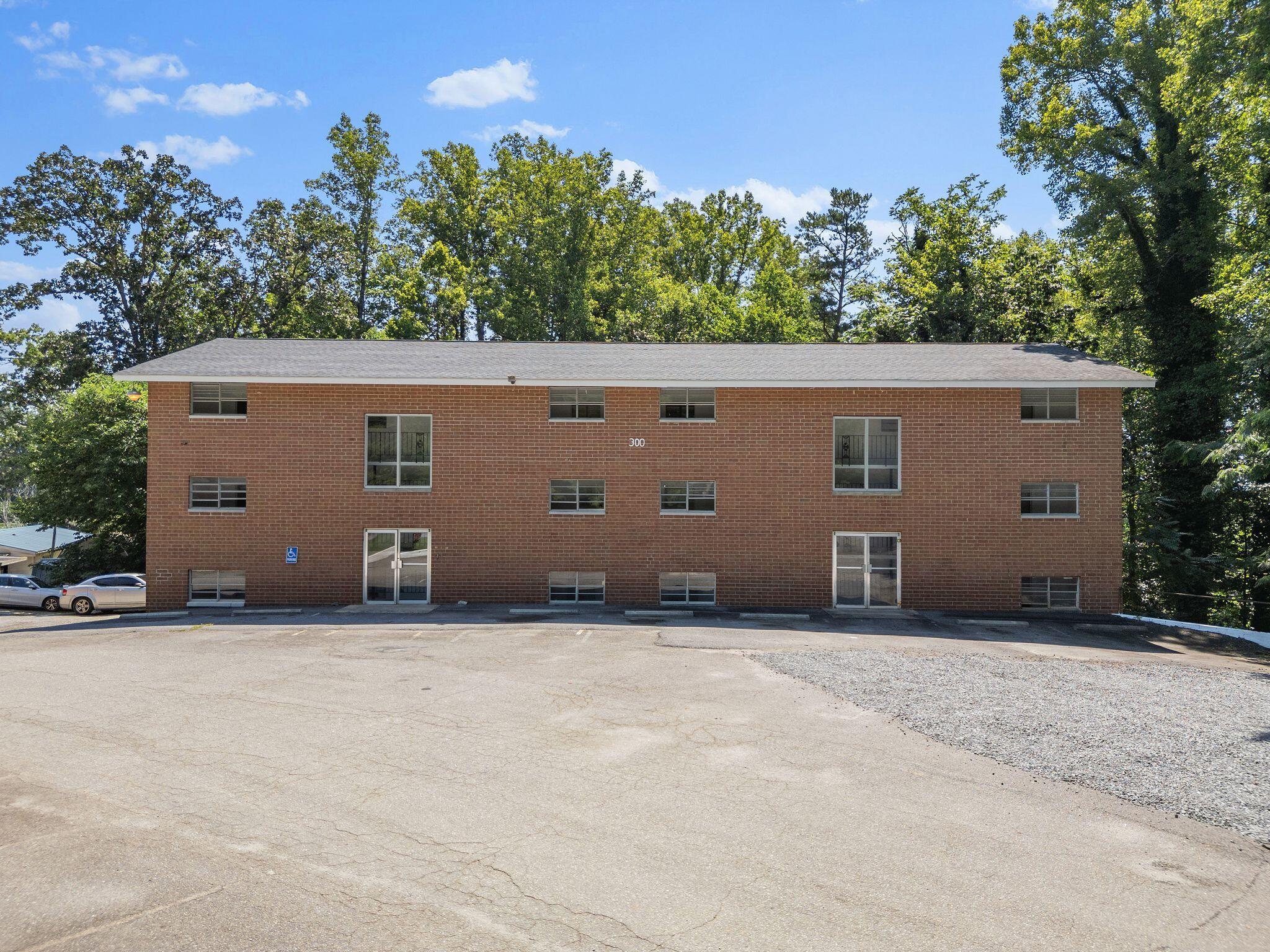 300 Ridgeview Lane, Unit 62 Bassett, VA 24055 - Photo 9 of 23 a house with trees in the background