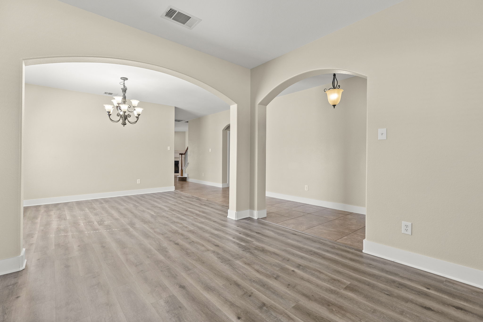 3013 Hawks Swoop Trail Pflugerville, TX 78660 - Photo 12 of 38 Formal living and dining area with new vinyl plank flooring.