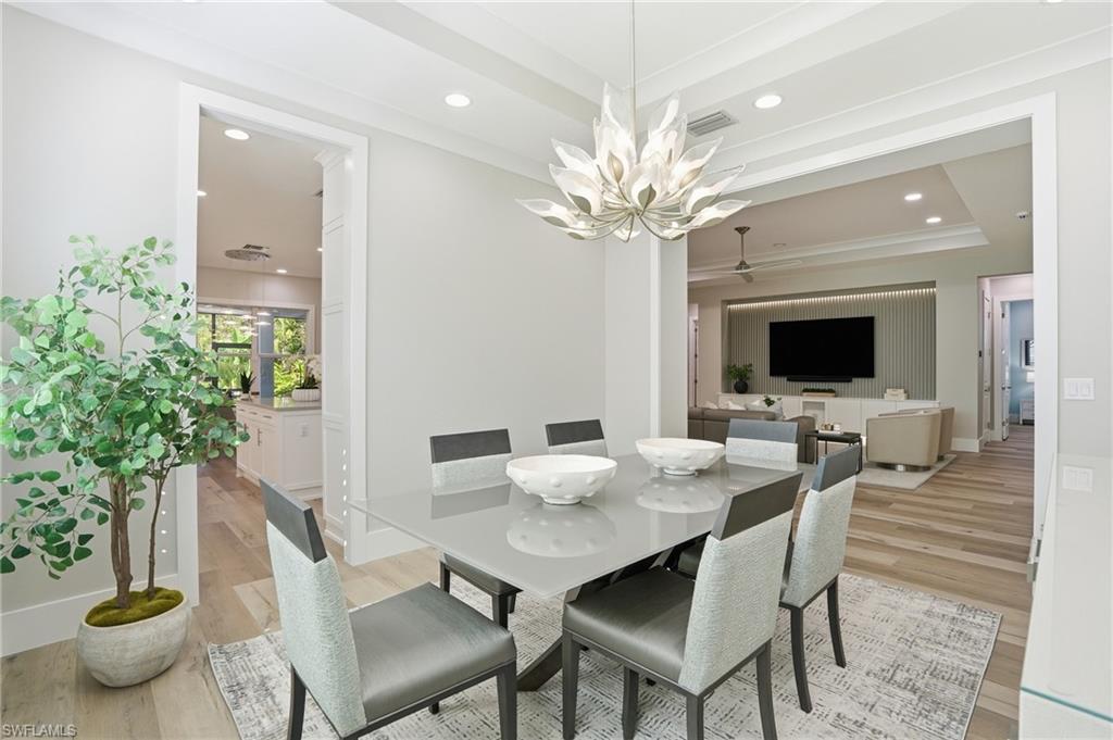 12021 Azalea Way Naples, FL 34120 - Photo 14 of 50 Spacious and bright dining room.