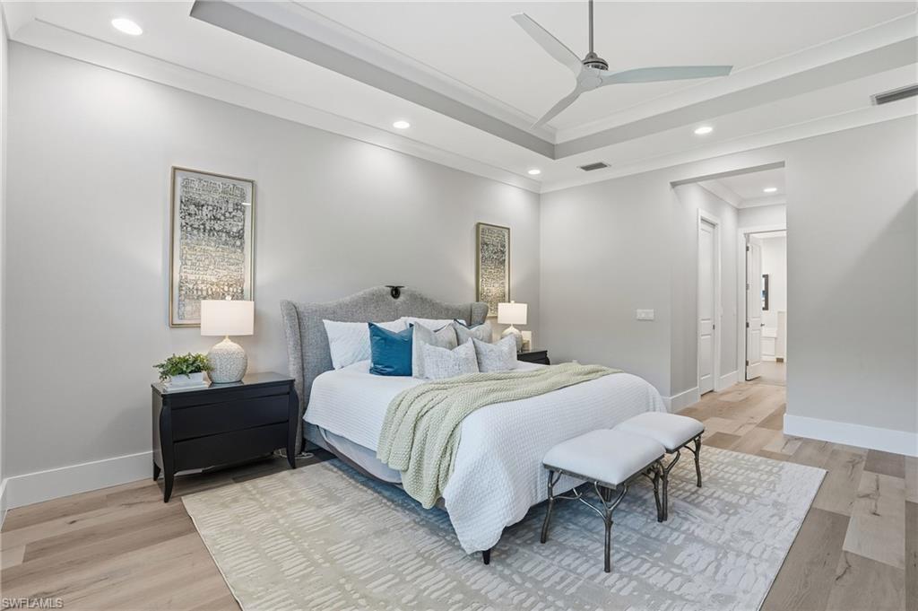 12021 Azalea Way Naples, FL 34120 - Photo 23 of 50 Coffered ceiling and elegant furnishings make a statement.