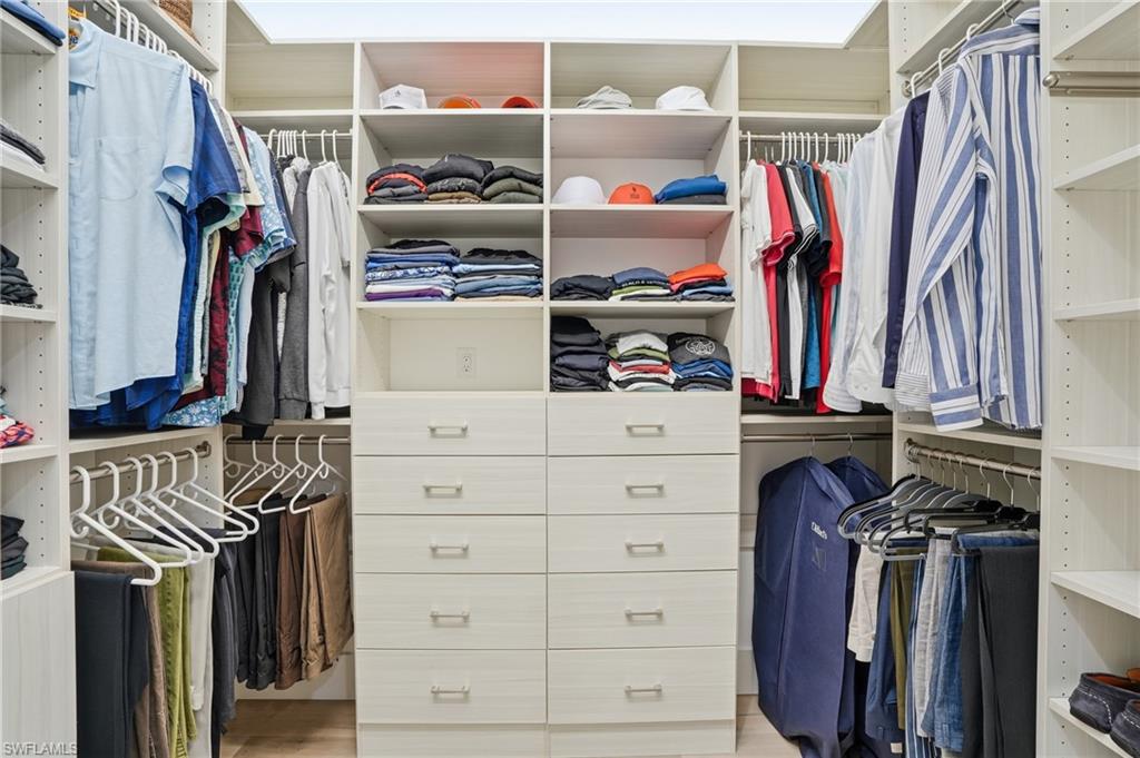 12021 Azalea Way Naples, FL 34120 - Photo 26 of 50 His primary custom closet.