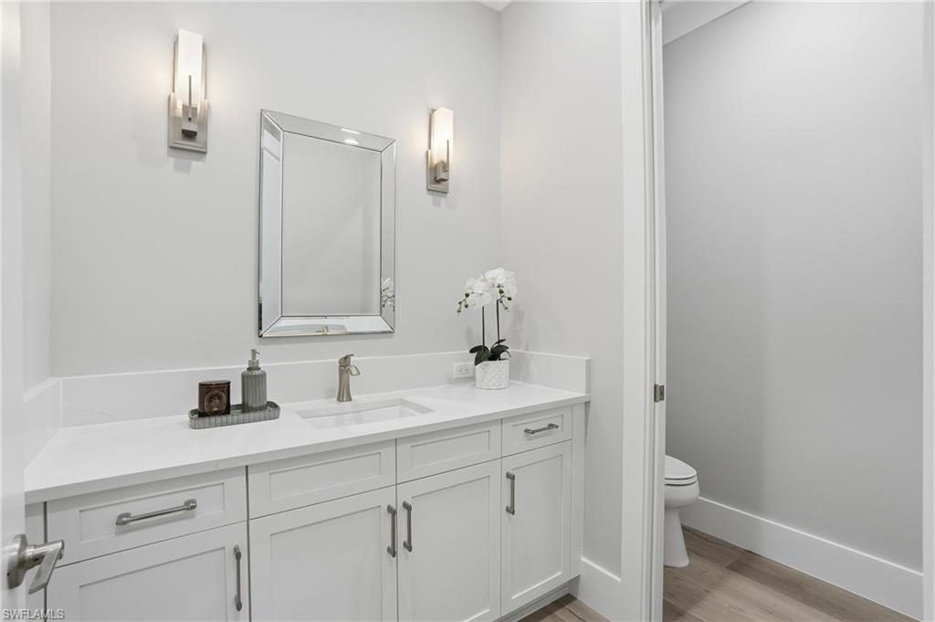 12021 Azalea Way Naples, FL 34120 - Photo 42 of 50 Powder room / guest bathroom.