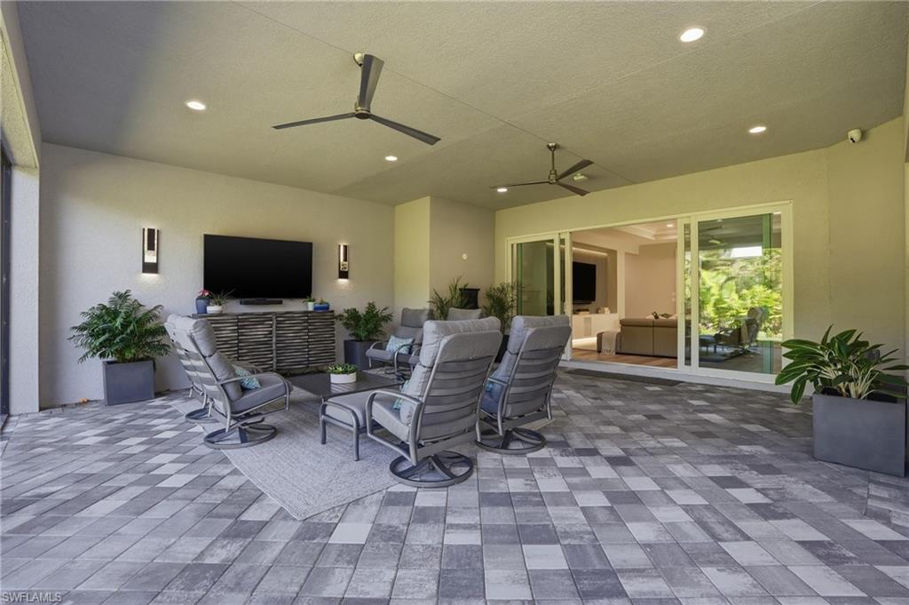 12021 Azalea Way Naples, FL 34120 - Photo 44 of 50 Large outdoor lanai with entertainment area.
