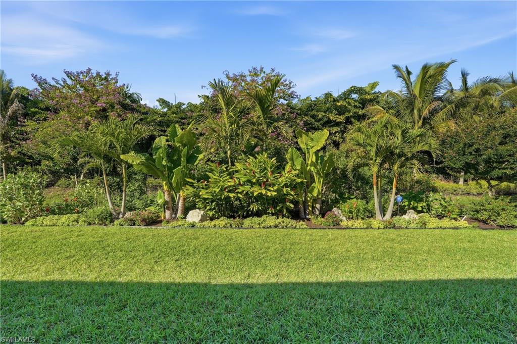 12021 Azalea Way Naples, FL 34120 - Photo 46 of 50 Butterfly garden and beautiful preserve view from the rear lanai.